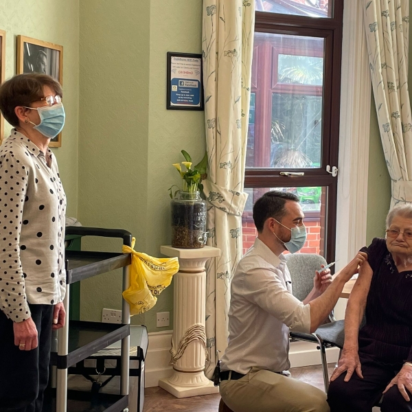 Olive Mingay (age 98) with Dr Tom Millar and her daughter Anita getting vaccinated.jpeg